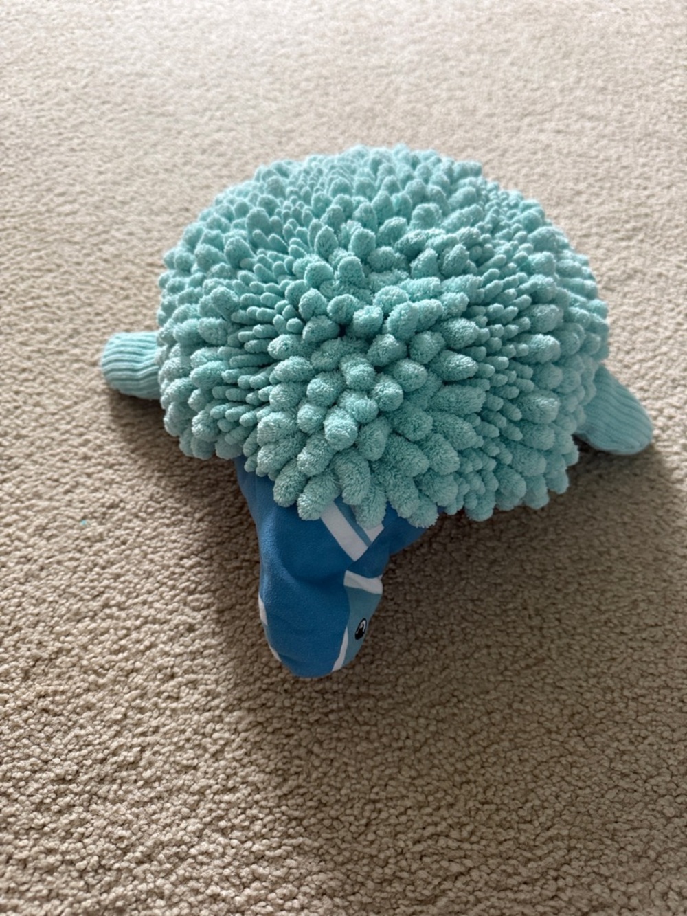 Plush Turquoise Norwex child hand drying turtle
